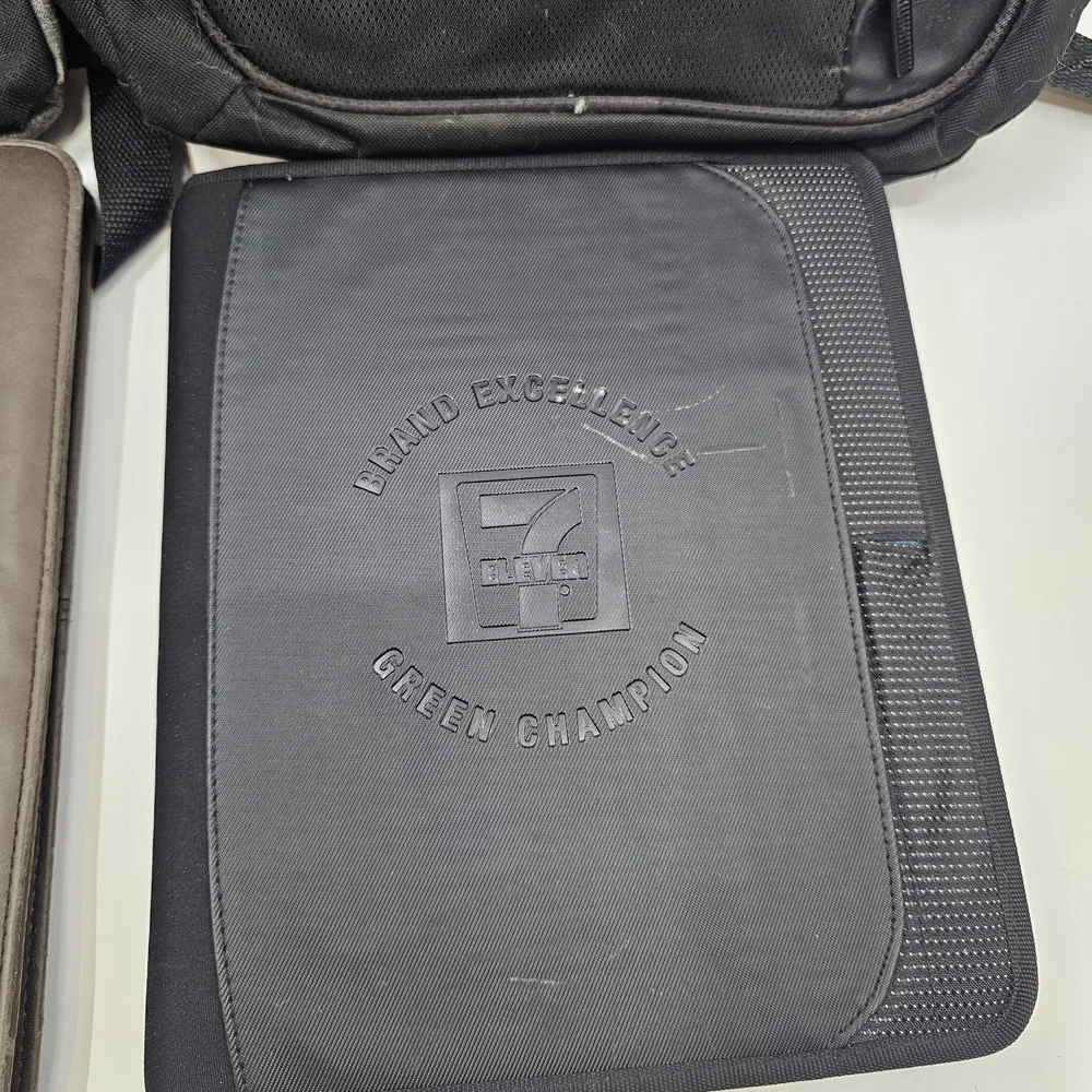 7-11 Logo Backpacks & Portfolio Binders Lot